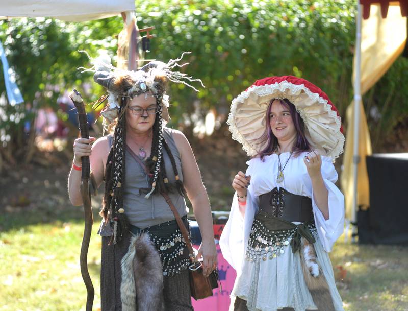 Liz Mathews and Rayceline McGuire of Sterling came in their costumes to the Olde English Fair at Stronghold Camp & Retreat Center on Saturday, Oct. 5, 2024, during the Autumn on Parade festival in Oregon. The mother and daughter said they often wear costumes to similar events.