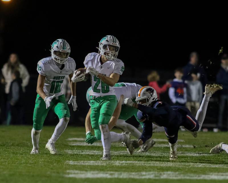 York's Henry Duda (26) runs with the ball during Class 8A second- round football game between York at Oswego on Friday, Nov 8, 2024  in Oswego.