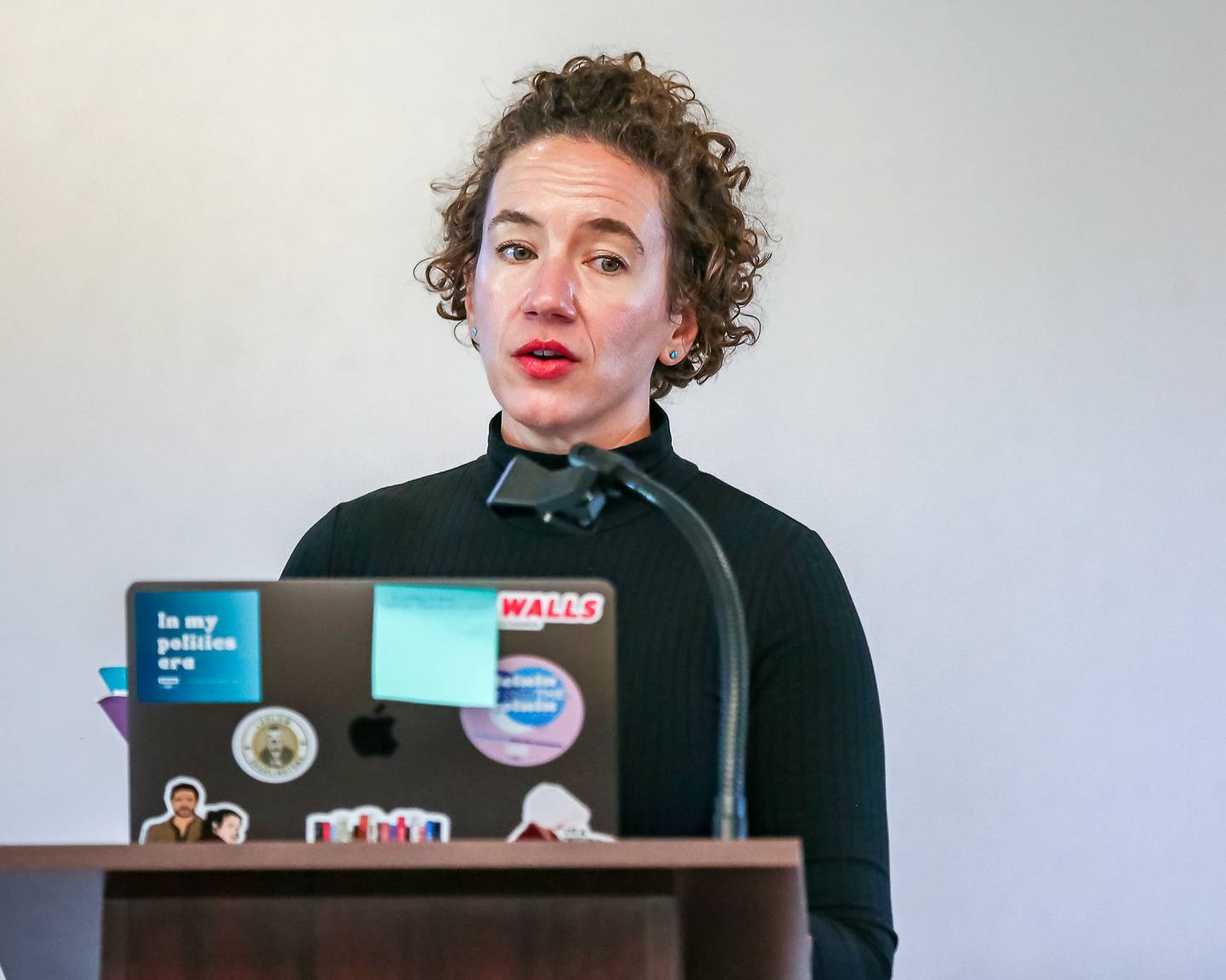 Ascension Healthcare's Government Relations Director, Julie Mirostaw speaks at the Community Town Hall to discuss Prime HealthCare's acquisition of Saint Joseph Hospital. Oct 16, 2024 in Joliet.