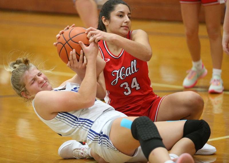 Princeton's Reese Reviglio and Hall's Natalia Zamora force a jump ball during the Princeton Holiday Girls Basketball Tournament on Saturday, Nov. 23, 2024 at Princeton High School.