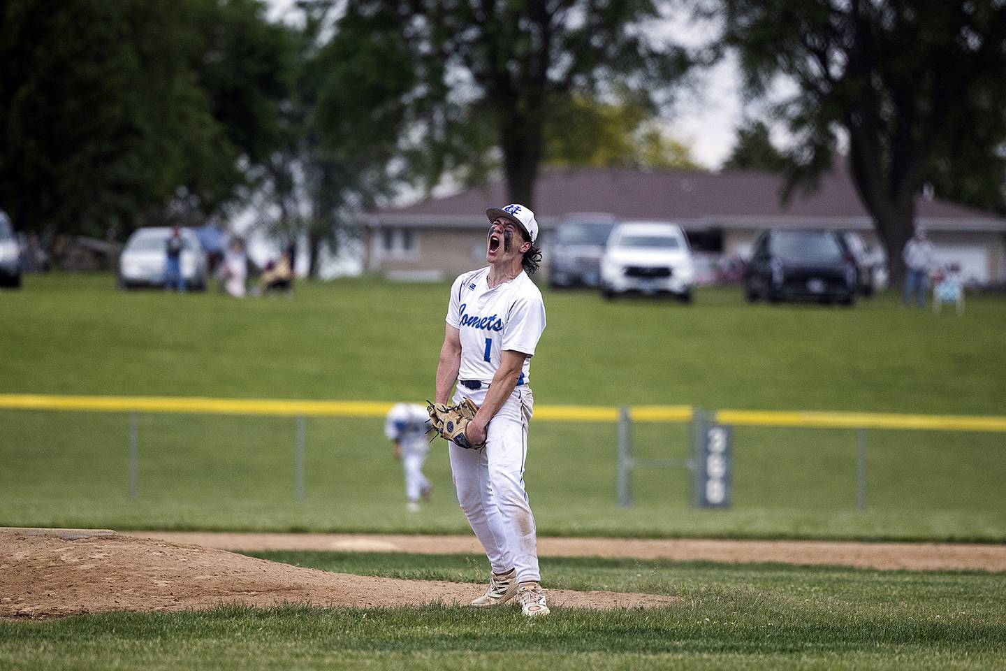 Newman’s Garret Matznick celebrates a game ending strikeout against Marengo Wednesday, May 28, 2025, in the Class 2A Sectional semifinal in Mendota.