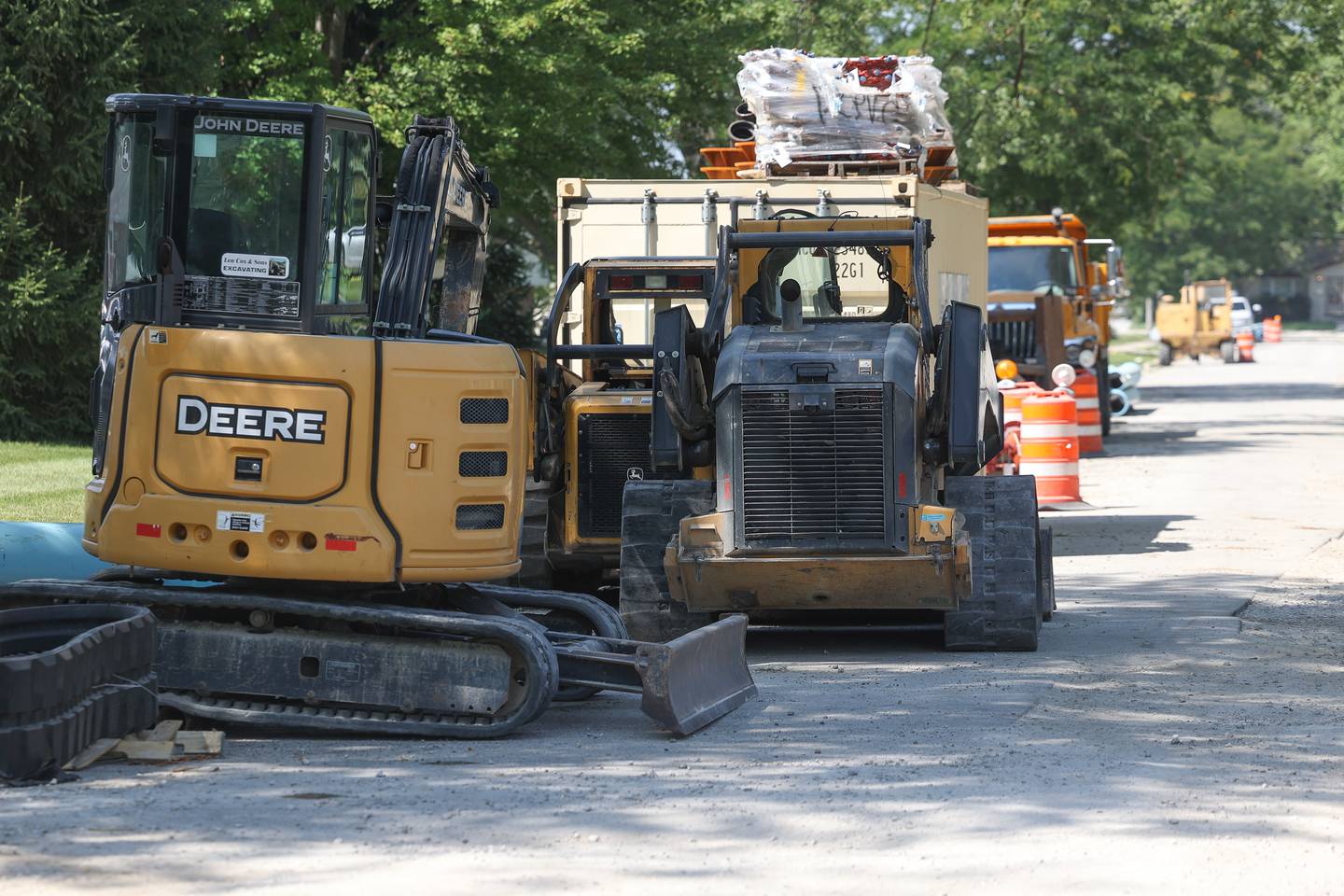 Construction equipment sit empty along West Acres Road as workers limit work due to the high temperatures on Thursday, Aug. 24, 2023 in Joliet.