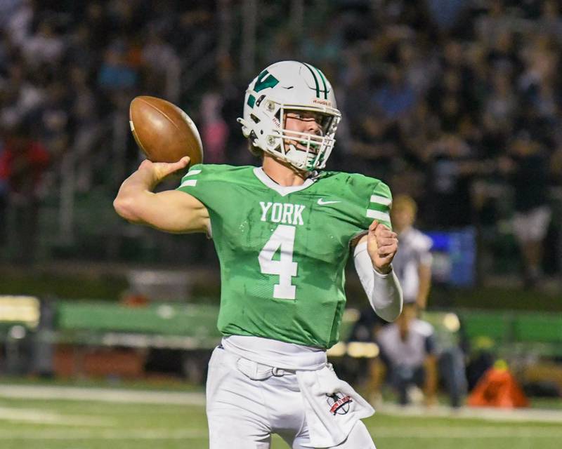 York quarterback Sean Winton throws for a touchdown during the second quarter Friday Sept. 1, 2023, in front of a home crowd in Elmhurst while taking on Nazareth Academy.