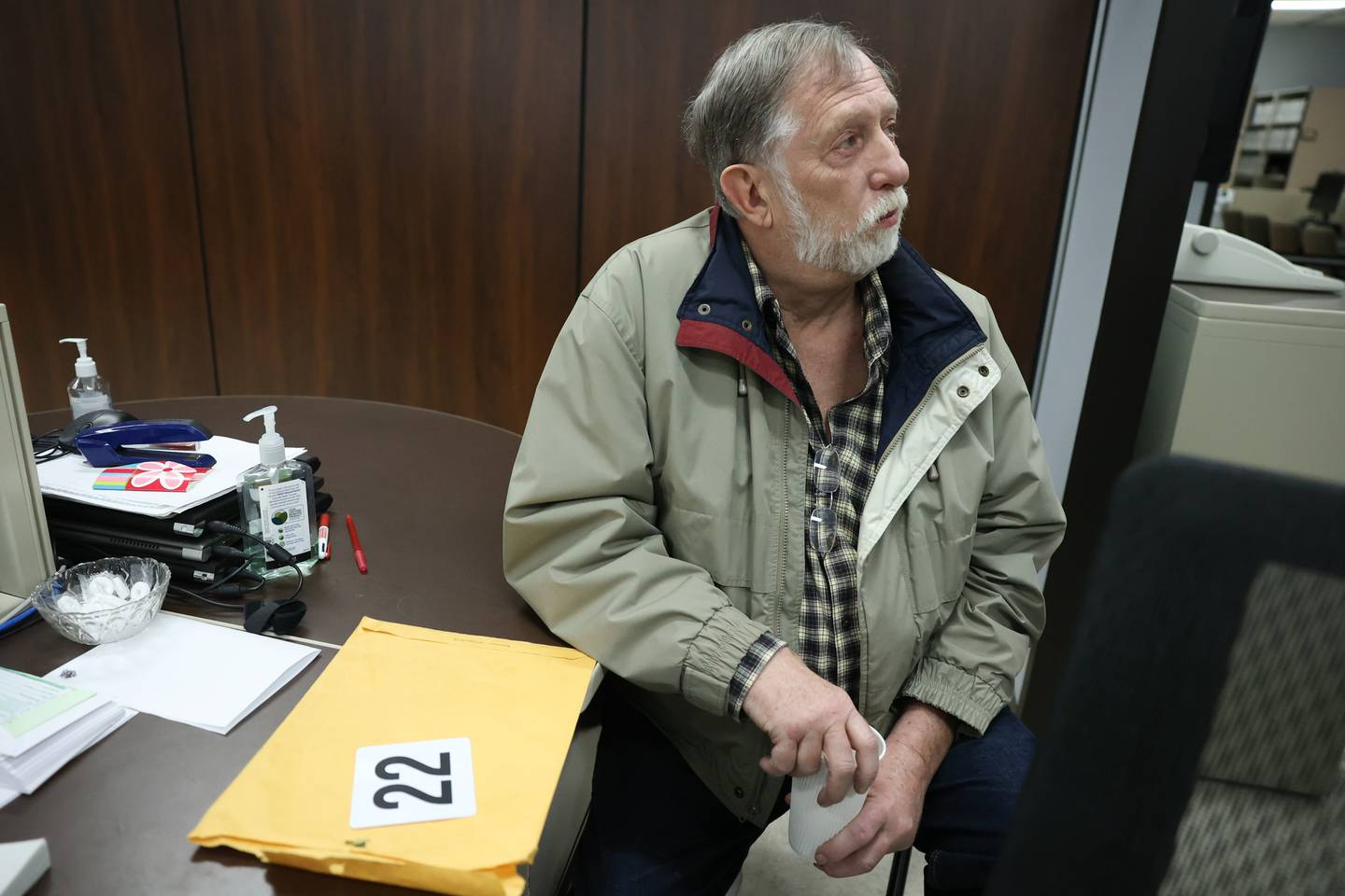 John Overend waits to file a petition to get on the ballot for Plainfield precinct committee person in the 2022 primary election at the Will County Office Building. Monday, Mar. 7, 2022, in Joliet.