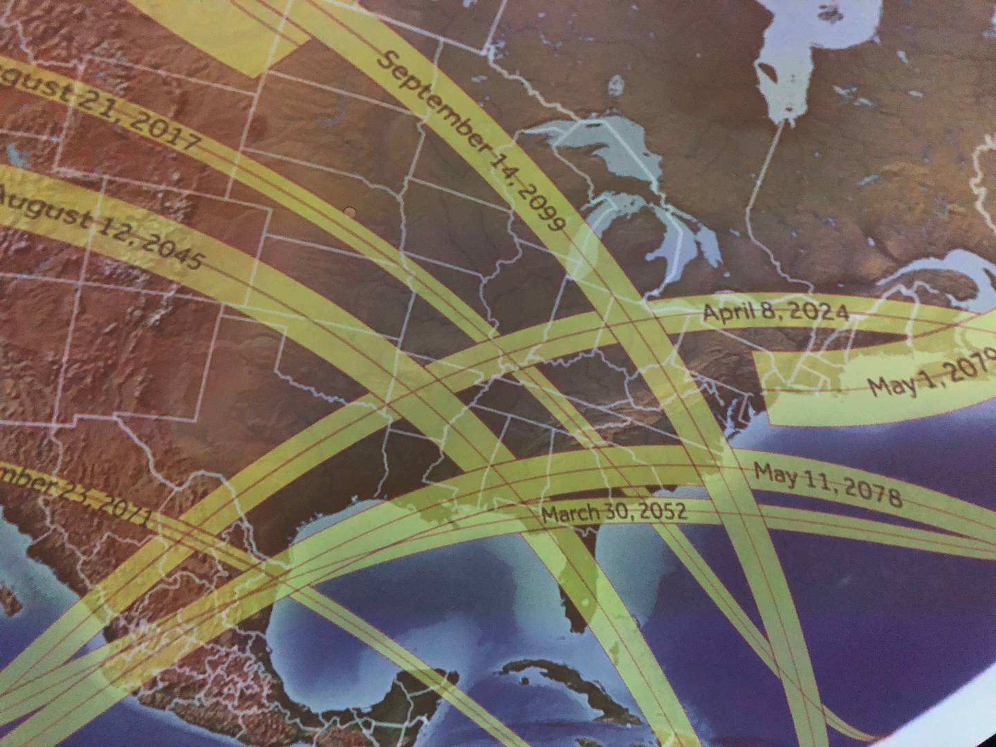 The dome at the McHenry County College's Planetarium shows the paths of eclipses this century in North America on Friday, April 5, ahead of April 8's solar eclipse. The planetarium has a show called “Eclipses of the Sun” show, which explores the mechanisms behind an eclipse.