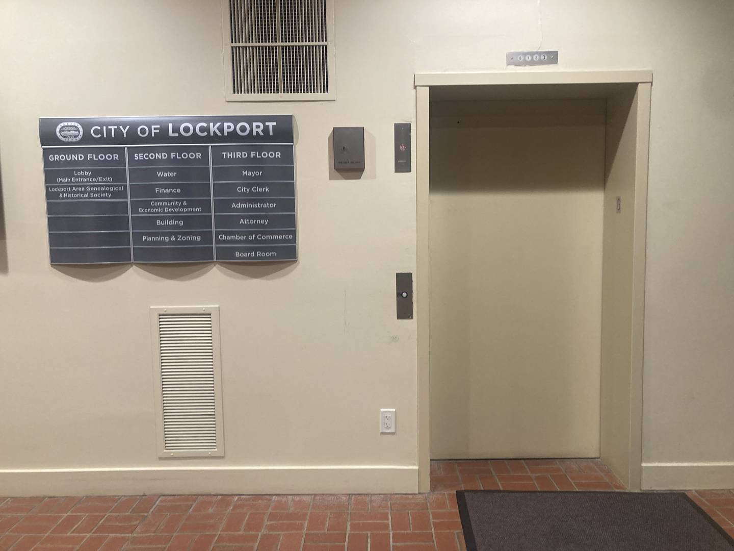 A directory sign and the elevator inside the main lobby of the Central Square City Hall building in Lockport. The building will receive its first renovation in 40 years this August. 
Wednesday, May 21, 2025.
