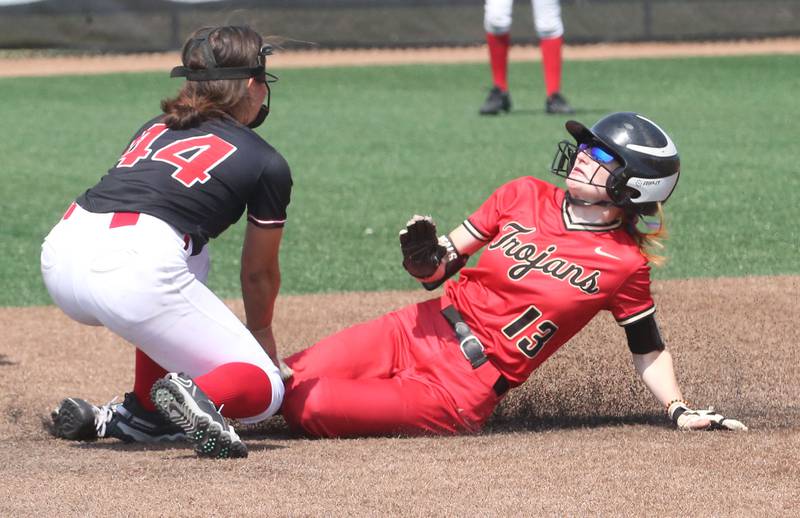 Benet Academy's Angela Horejs tags out Charleston's Avery Beals while sliding into second base during the Class 3A State third place game on Saturday, June 10, 2023 at the Louisville Slugger Sports Complex in Peoria.