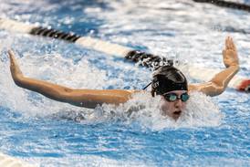 Photos: IHSA Girls State Swimming Preliminaries