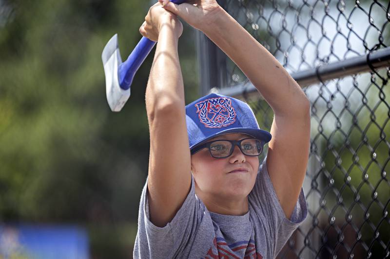 CJ Lawson, 11, of Tampico loads up to throw at the Whoop Your Axe booth Saturday, July 22, 2023 at Tampico Days.