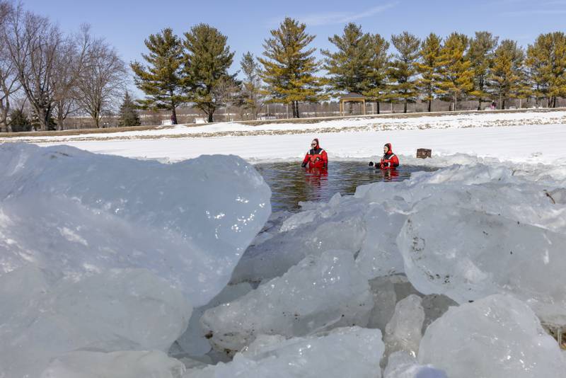 Mendota Fire Department rescue divers Aaron Perryman and Nate Tolley braved the frigid waters to assist participants into and out of the water during the Polar Plunge for Special Olympics on February 22, 2025 at Lake Mendota.