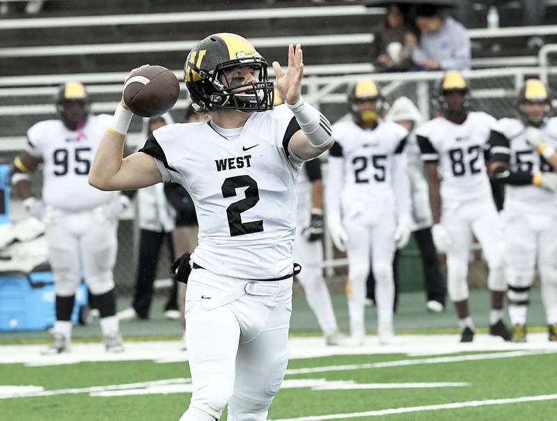 Joliet West's Jaxon Aubry throws a pass during a game last season. (Photo by Larry W. Kane for Shaw Media)