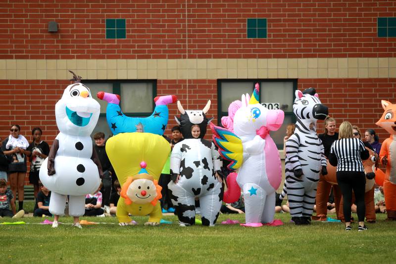 Teachers and staff members surprised students at Emily G Johns Elementary School in Plano with an inflatables race on Tuesday, May 27. 2025 after the all-school field day to celebrate the end of the school year.