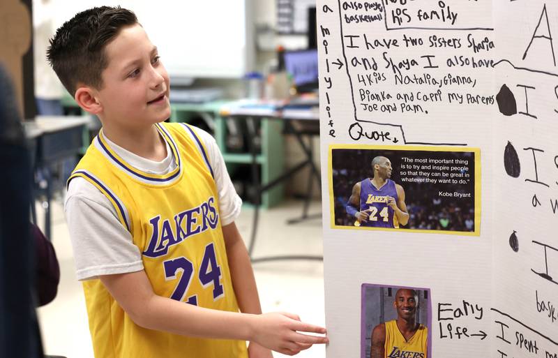 Max Young, a fifth grade student at Malta Elementary School, portrays Jackie Robinson Monday, March 4, 2024, during the schools Wax Museum. In honor of Black History Month students in fifth grade at the school research a Black historical figure and do a presentation on their person at the end of the month.