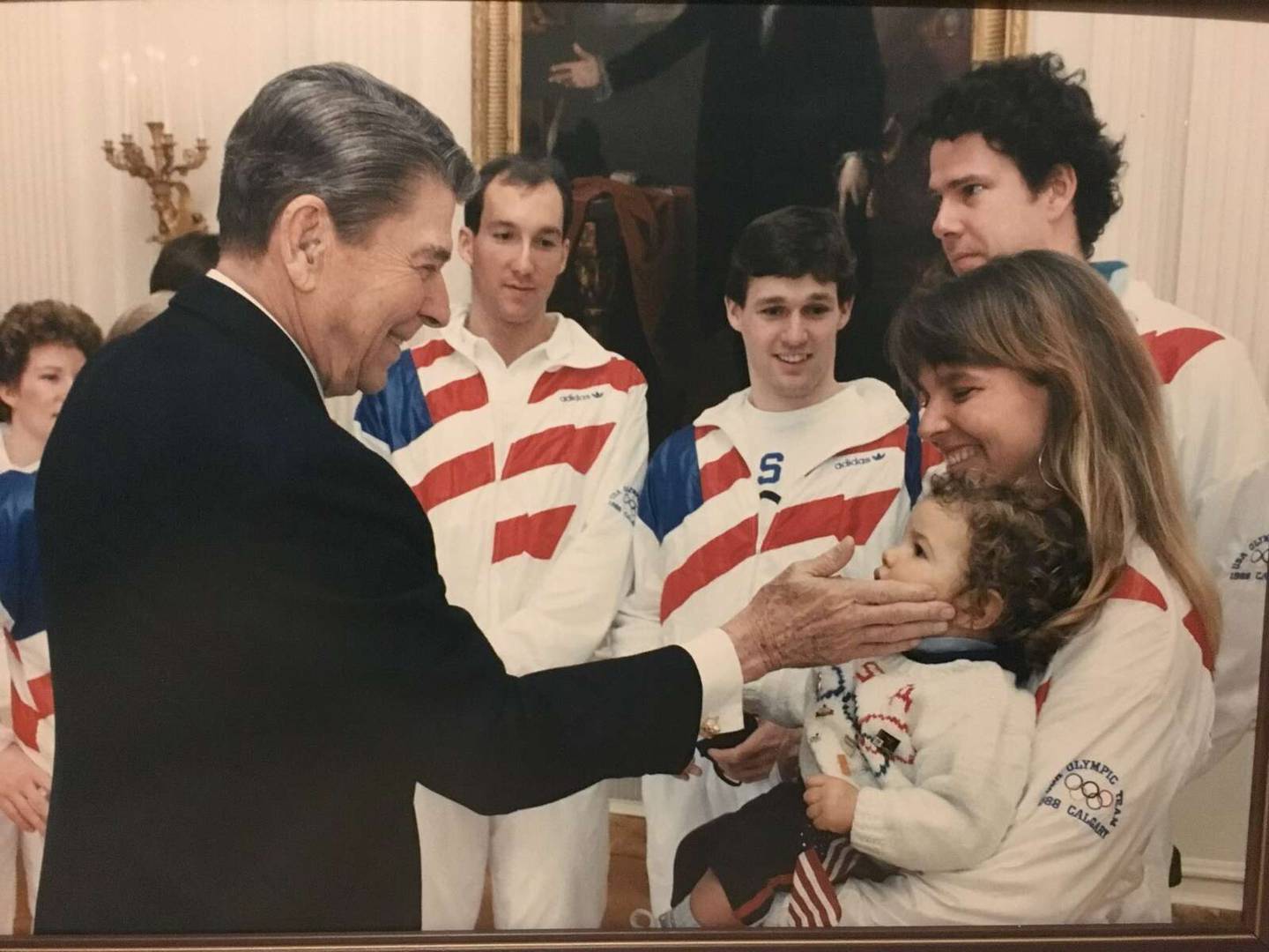 Nancy Swider-Peltz Sr. introduces her daughter, Nancy Jr., to President Ronald Reagan as the U.S. Olympic speed skating team visits the White House in 1988.