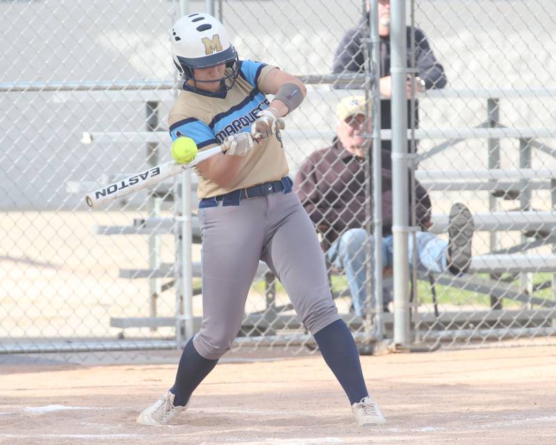Marquette's Makayla Backos, makes contact with the ball against Putnam County on Tuesday, April 29, 2025 in Ottawa.