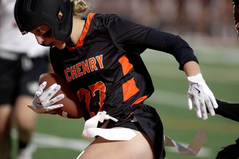McHenry’s Chloe Casey heads for the end zone on a touchdown against Antioch in IHSA Regional Title Game action flag football at McHenry High School in McHenry on Thursday, Oct. 10, 2024.