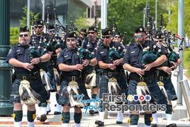 Joliet police pipe and drum band plays on
