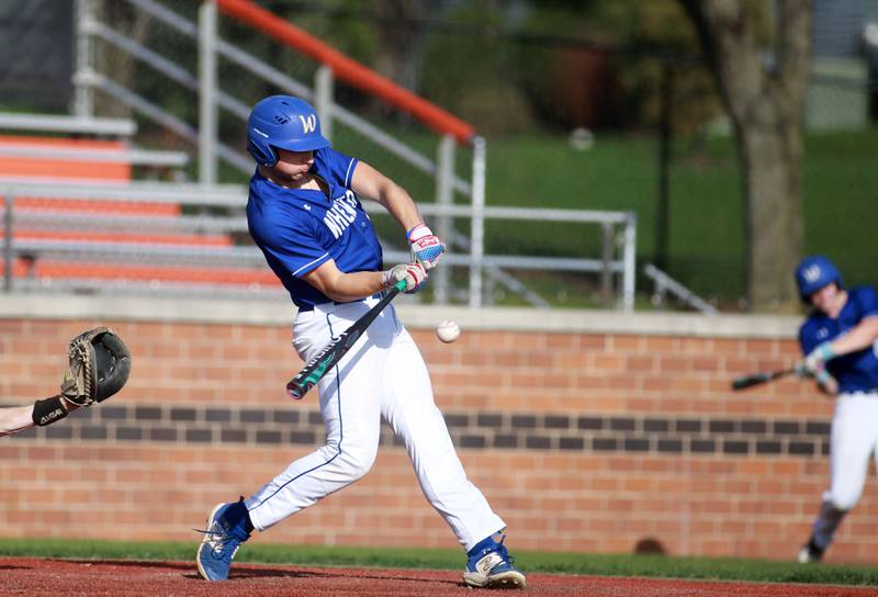 Wheaton North's Jake Williams makes contact during a game against St. Charles East on Wednesday, April 23, 2025 in St. Charles.