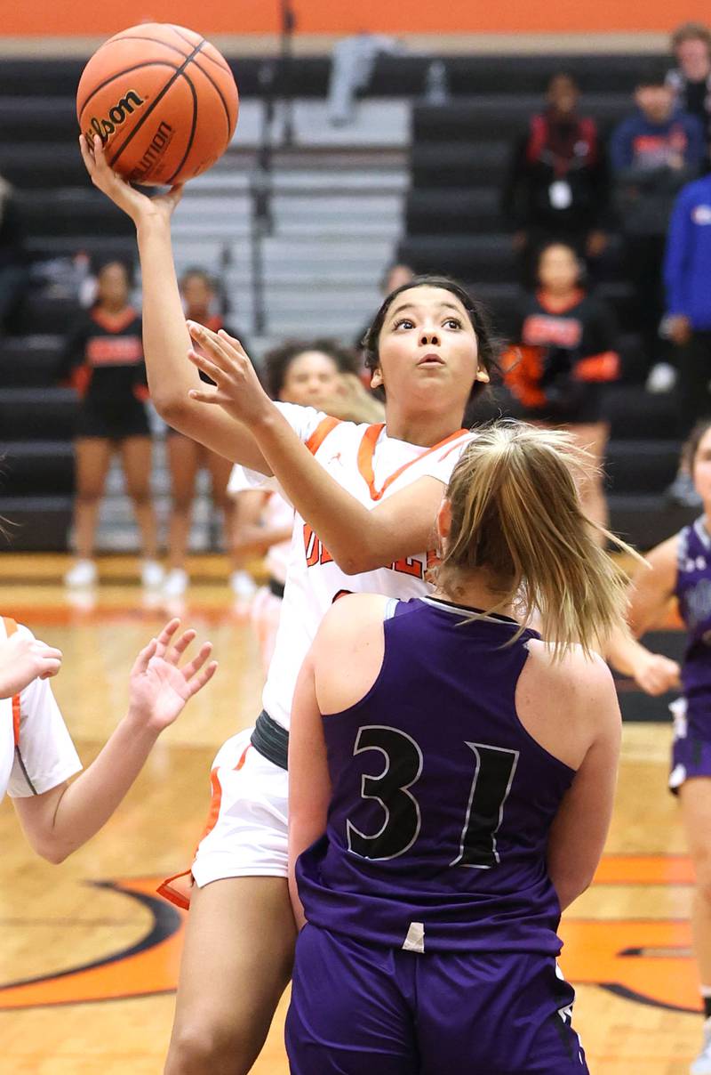 DeKalb's Alicia Johnson shoots over Rochelle's Kendyl Darby during their game Monday, Nov. 28, 2022, at DeKalb High School.