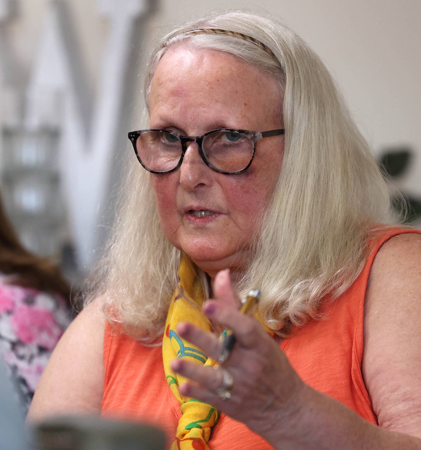Judy Bowman, 75, a resident of Heritage Woods of DeKalb, gives her thoughts on Medicaid Monday, July 14, 2025, during a discussion at the assisted living facility.