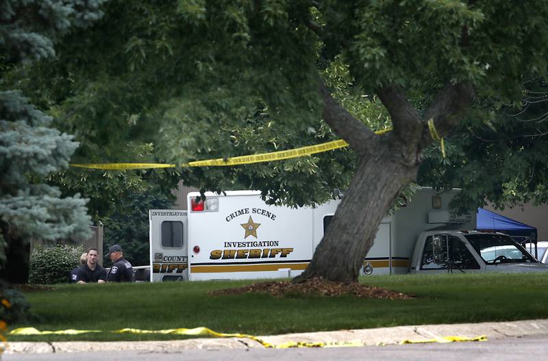 Officers from the McHenry County Sheriff and other departments investigate a domestic incident in which four people were killed on Wednesday Aug. 9, 2023, in the 5800 block of Wild Plum Road in unincorporated Crystal Lake. Police later said they were family members.