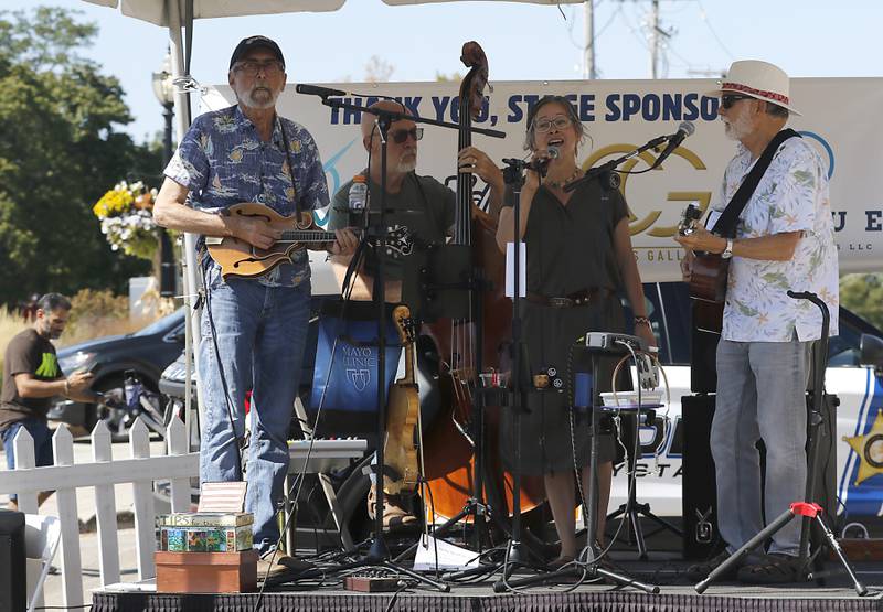 Cheryl & The Down Home Boys perform on the stage at the Taste of Downtown during the Johnny Appleseed Festival on Saturday, Sept. 27, 2025, in downtown Crystal Lake. The festival featured live performances, food and family-friendly activities.