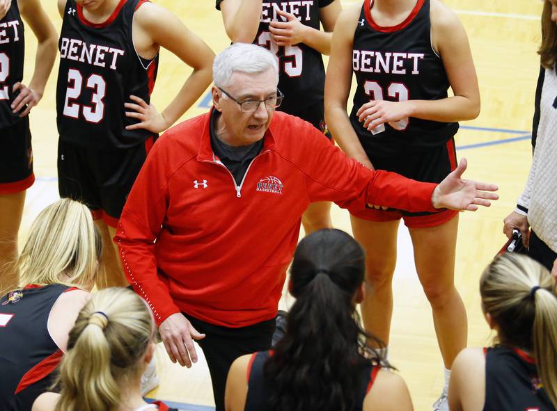 Benet coach Joe Kilbride talks to the team during the girls varsity basketball game between Benet Academy and Lyons Township on Wednesday, Nov. 30, 2022 in LaGrange, IL.