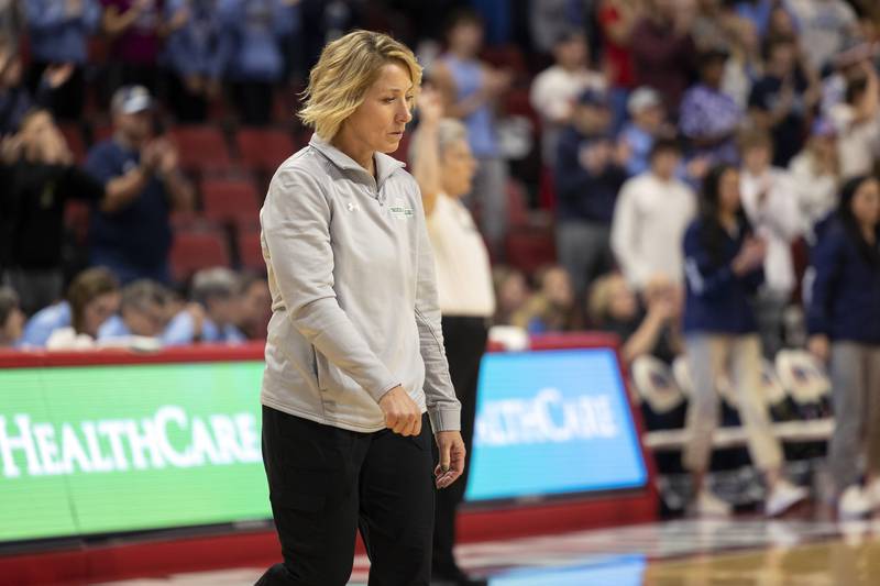 Coach Sheila Pillars takes the court following the Rocket’s two set loss against Breese Mater Dei in the 2A state semifinal Friday, Nov. 10, 2023 at CEFCU Arena in Normal.
