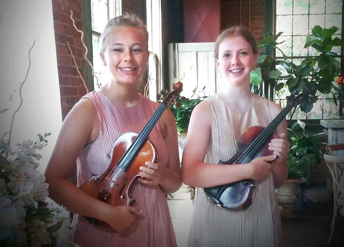 Emma Fredericks, 17, and Eva Peterson, 16, from Eva & Emma: Classical Duettes will perform at Lizzy's Pink Boutique on Friday, November 18 as a part of Moonlight Magic.