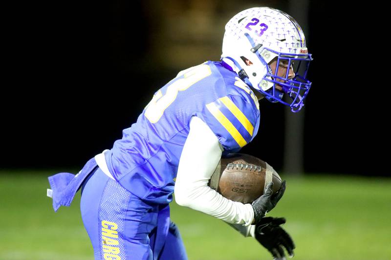 Aurora Central Catholic’s Aidan Crisci returns a kickoff against Richmond-Burton in IHSA football Class 3A second-round playoff action at Bob Stewart Field on the campus of Aurora Central Catholic High School in Aurora on Friday, November 7, 2025.