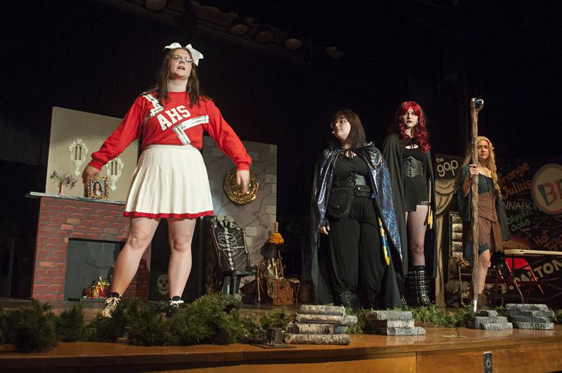 Rosie Knaggs (left), playing the part of Agnes Evan, meets Tilly, played by Karalynn Kirkpatrick, Lilith, played by Rowan Onken and Kaliope, played by Hannah Zinke during a rehearsal scene of Morrison High School’s “She Kills Monsters” on Wednesday, May 4, 2022.