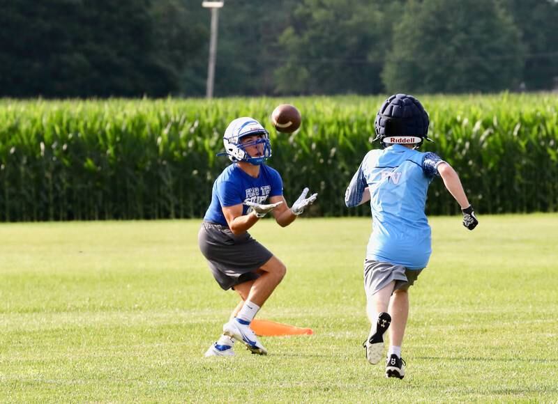 PHS senior Augie Christiansen makes a wide-open catch during Monday's 7 on 7 game with Bureau Valley at Little Siberia.