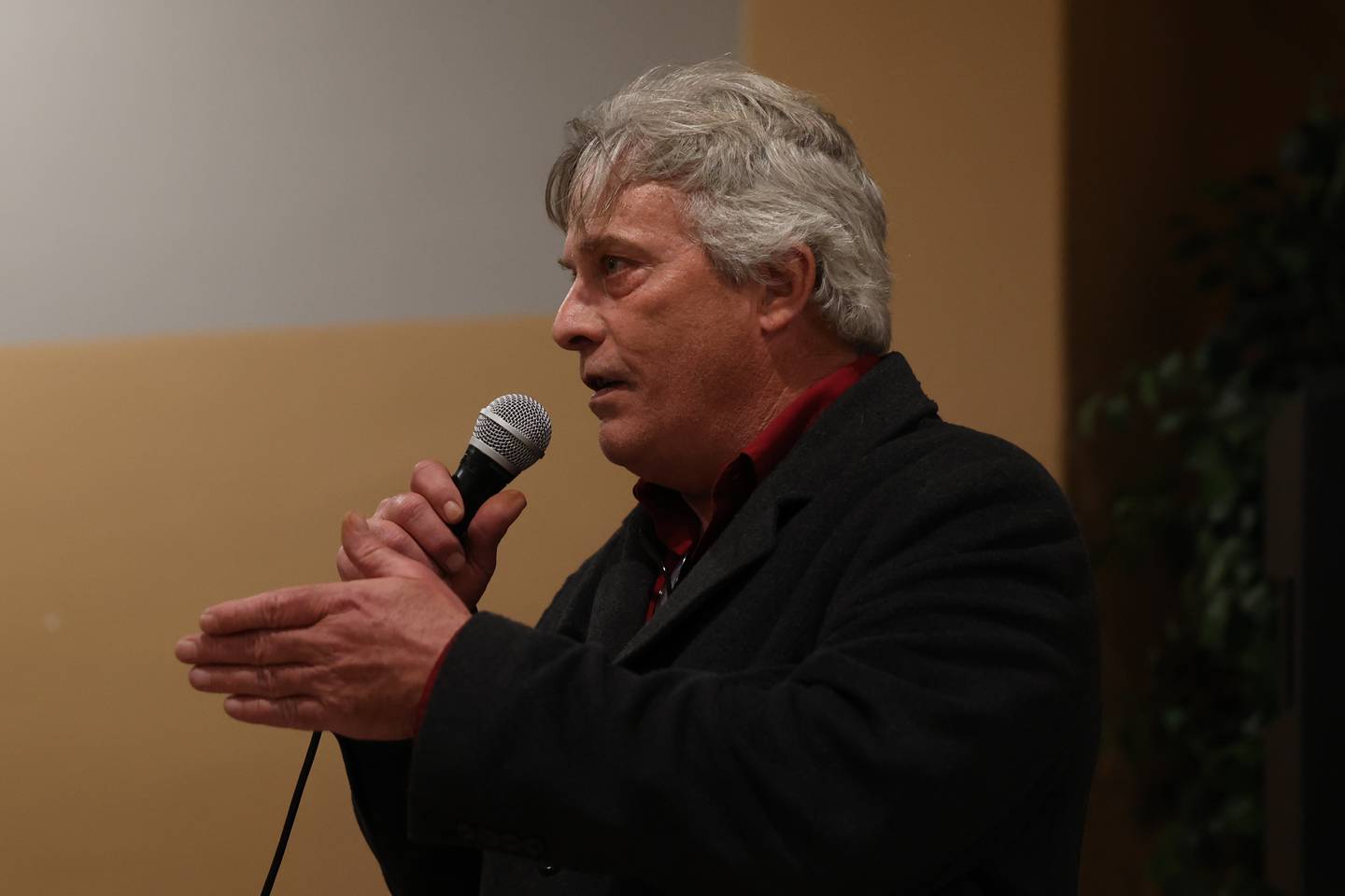 Joliet City Council member Larry Hug shares a few words of encouragement after Joliet Mayor Bob O’Dekirk thanked his supporters in his concession speech on Tuesday, April 4, 2023.