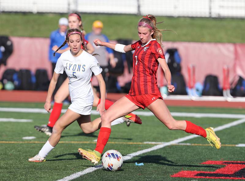 Hinsdale Central's Avery Edgewater (7) tracks down the ball against Lyons Township's Jillian Herchenroether (5) during the girls varsity soccer match between Lyons Township and Hinsdale Central high schools in Hinsdale on Tuesday, April 18, 2023.