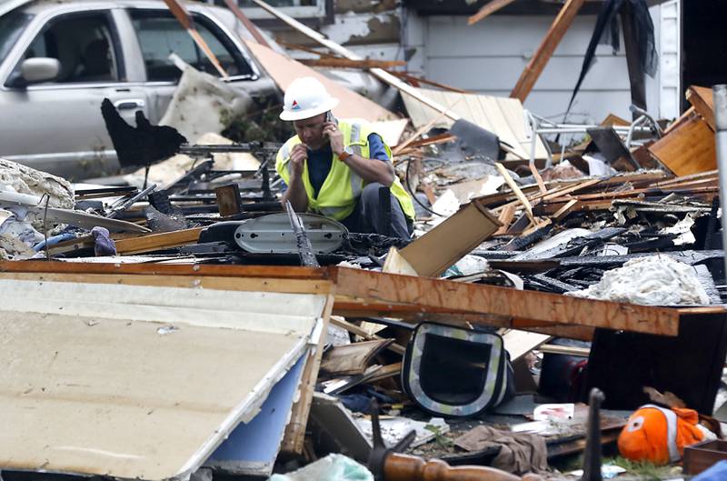 Authorities look for the cause of a home explosion on Monday, May 18, 2026, in 7400 block of Birch Drive, in Wonder Lake, after the Sunday evening explosion. One resident of a home was killed and two others have been taken to the hospital.
