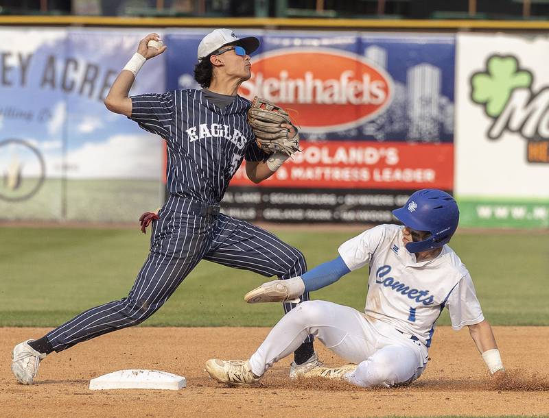 Newman’s Garret Matznick breaks up a double play against Chicago Hope’s Matthew Mendez Monday, June 2, 2025, during the Class 2A Supersectional at Northwestern Medicine Field in Geneva.