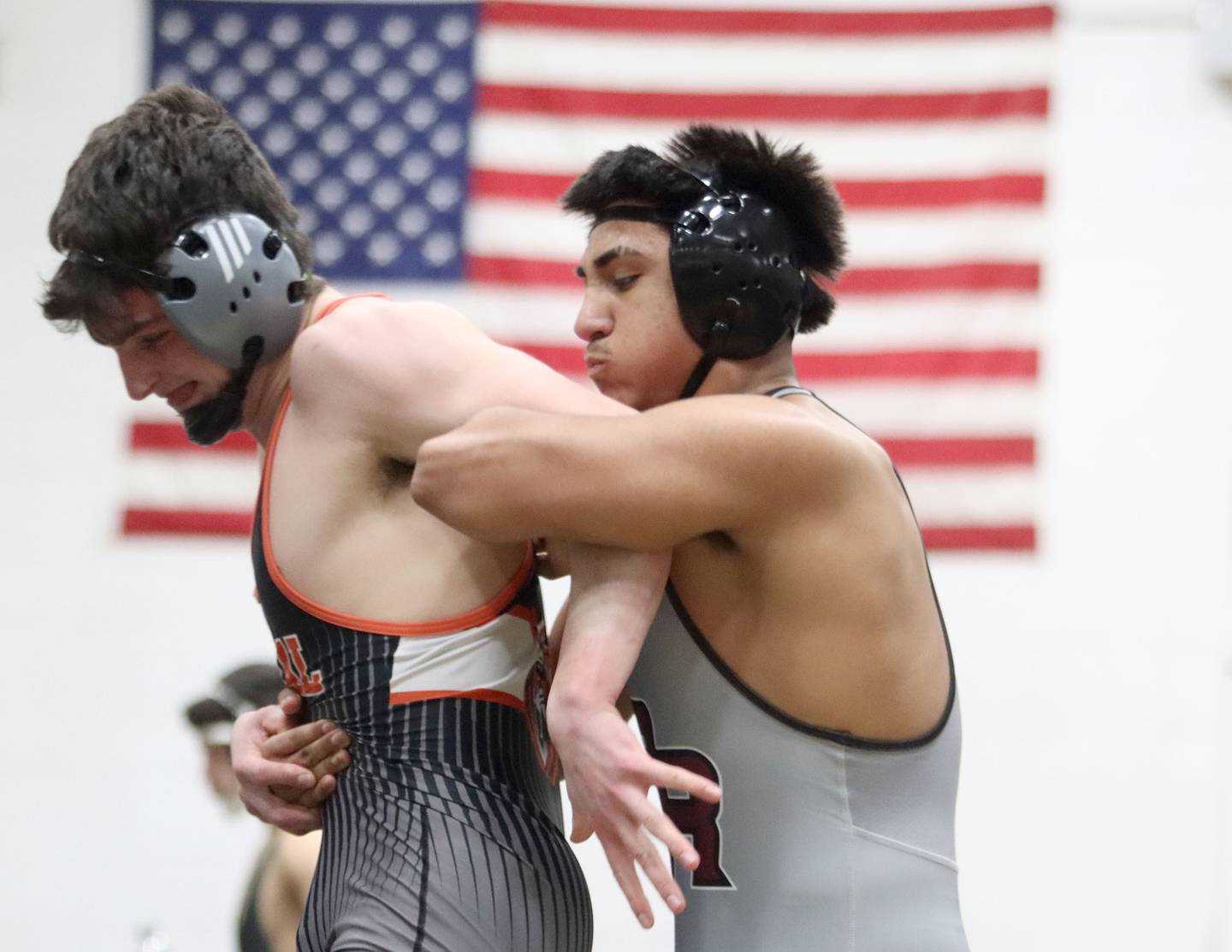 Prairie Ridge’s Aiden Rodriguez, right, battles Crystal Lake Central’s Nicholas Zuehlke at 175 pounds in boys wrestling IHSA Class 2A Regional championship bout action on Saturday, Jan. 31, 2026, at Harvard High School in Harvard.