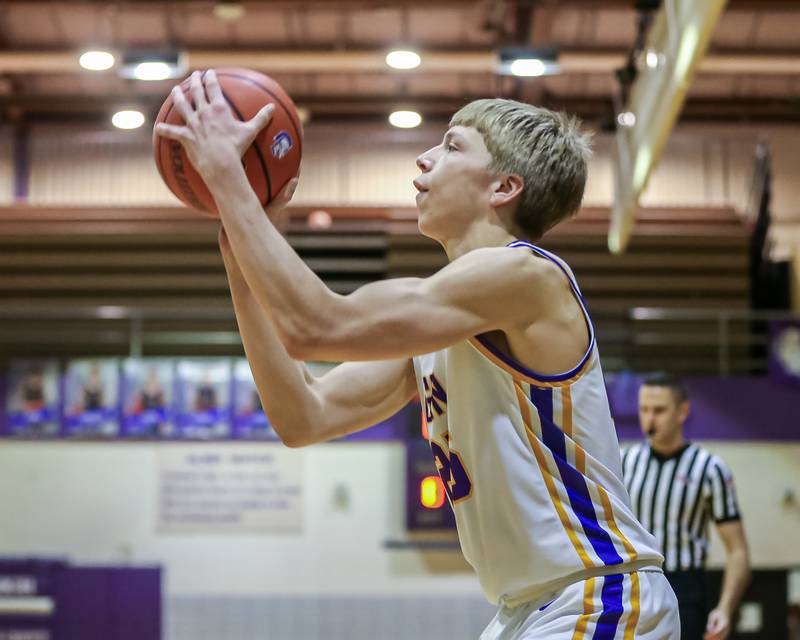 Downers Grove North's Alex Miller (25) shoots a jump shot during basketball game between Downers Grove South at Downers Grove North. Dec 16, 2023.
