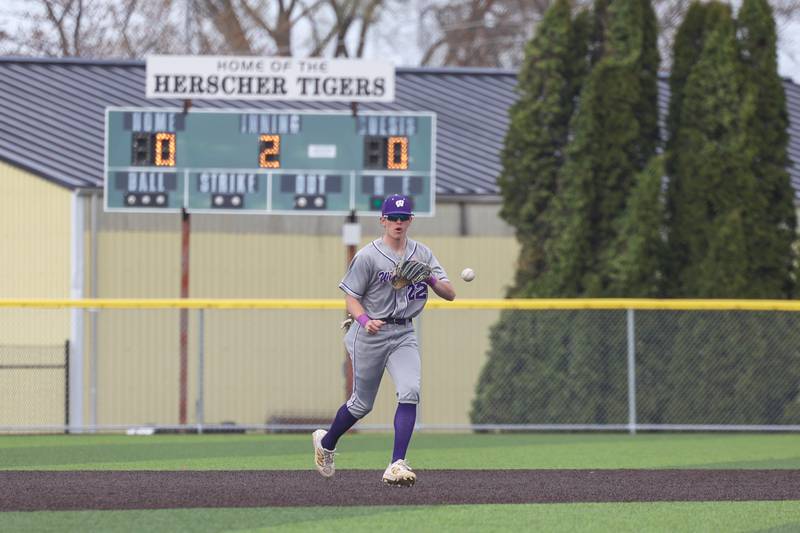 Wilmington Ryan Kettman fields a ball at short stop during the Wildcats' 3-0 victory over Herscher on Monday, April 14, 2025.