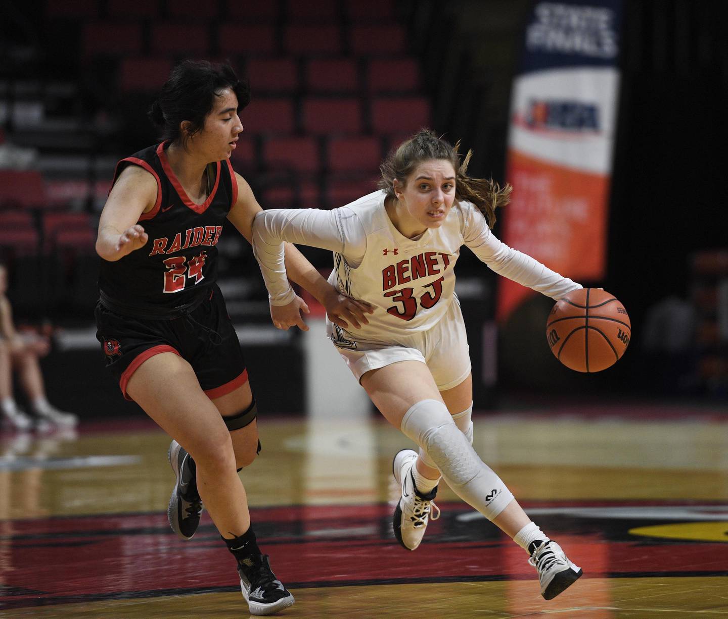 Benet Academy’s Maggie Sularski drives against Bolingbrook's Yahaira Bueno in the Class 4A state 3rd place game at Redbird Arena at Illinois State University in Normal on Friday, March 4, 2022.