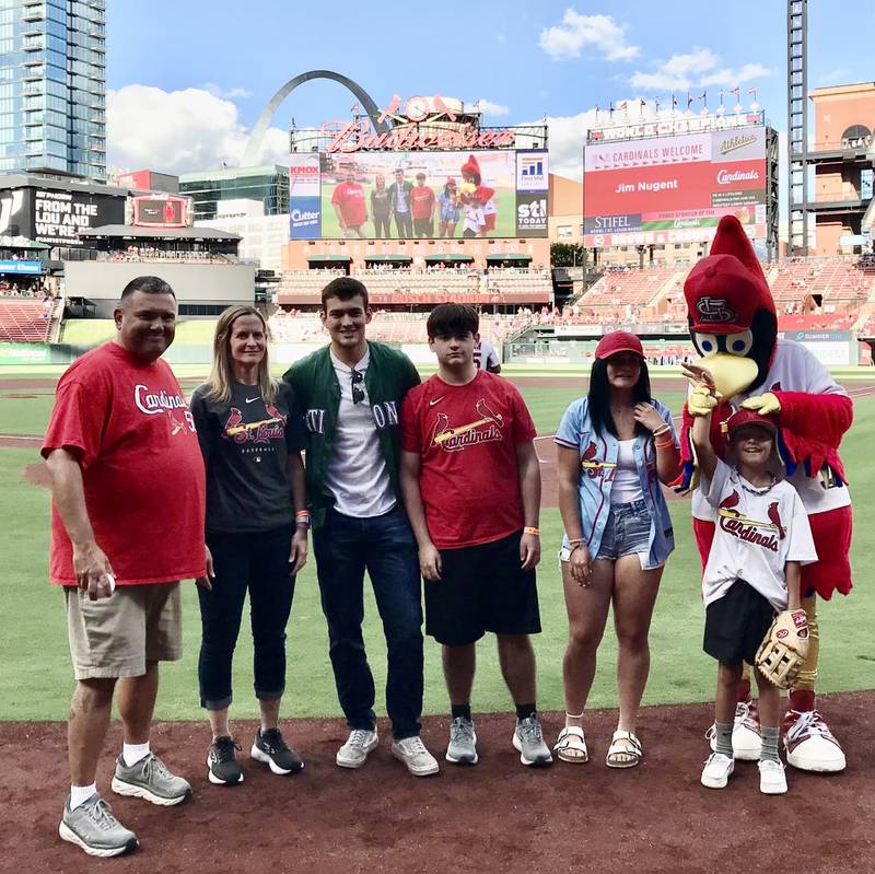 Jim Nugent celebrated his "first pitch" at Monday's Cardinals game with his family and Fredbird - Amber, Mac, Nolan, Mya and his nephew, Everett.