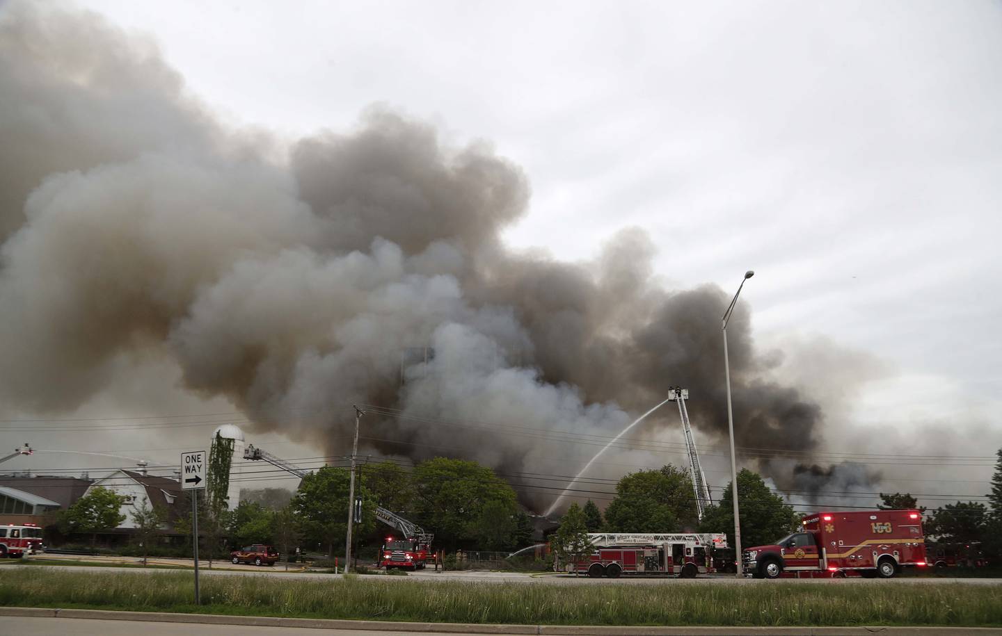 Smoke billows from the former Pheasant Run Resort as firefighters battle a blaze on Saturday in St. Charles.