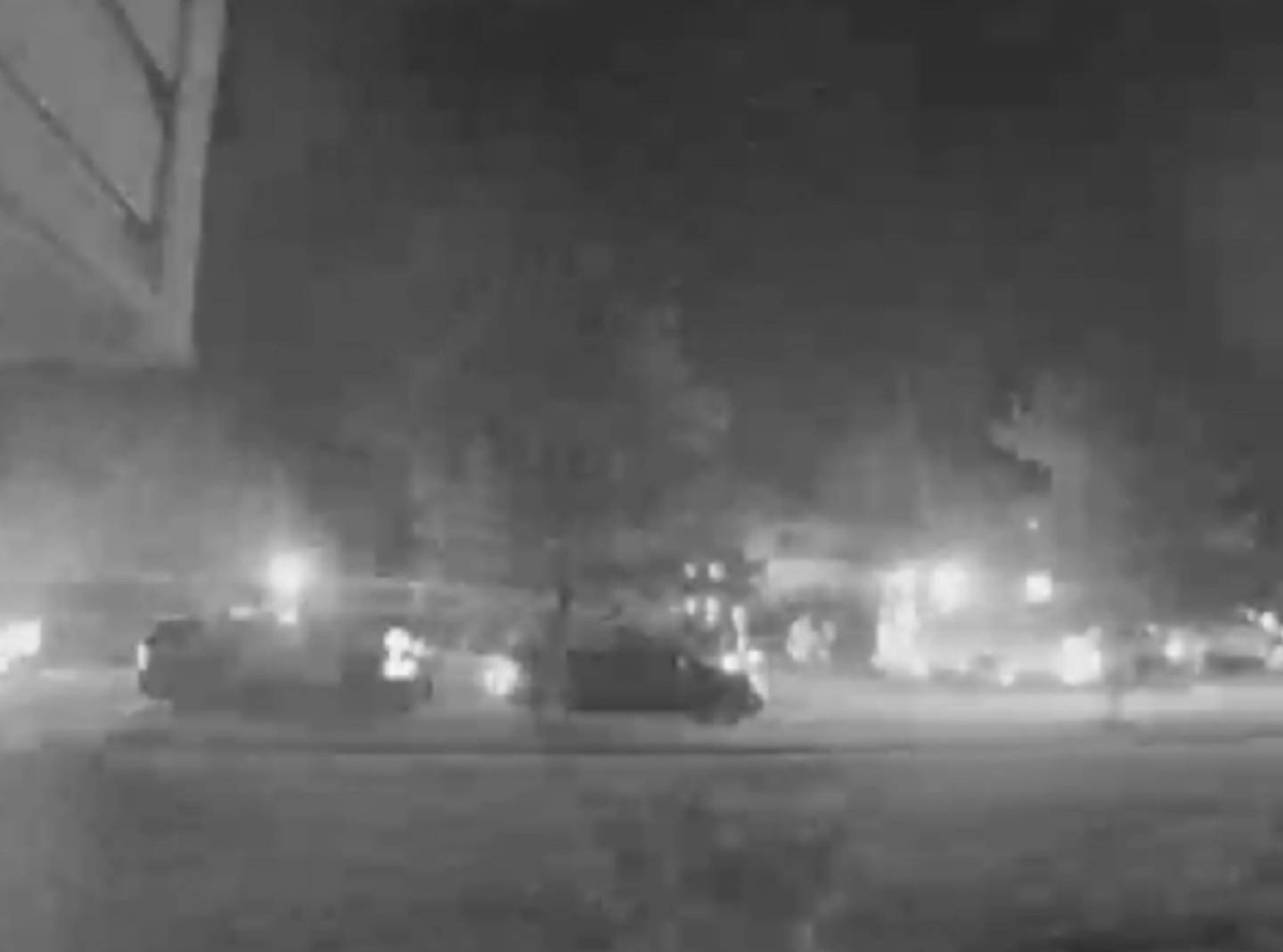 Video still showing police squad vehicles outside of a residence in the 7000 block of Hadrian Drive in Joliet on Friday, Aug. 15, 2025.