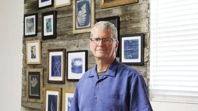 Erie photographer shines a light on business