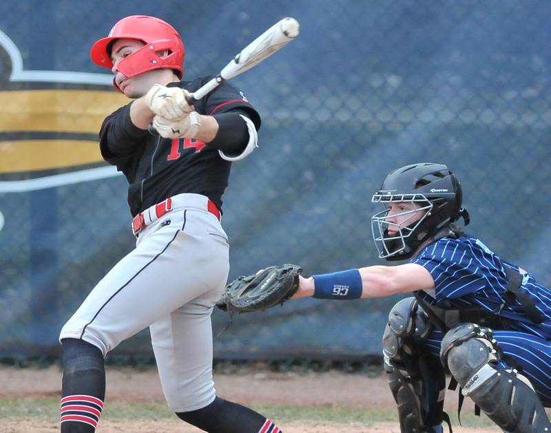 Benet's Luke Bafia knocks in the tying run against Nazareth in the seventh inning of a game on Apr. 12, 2022 at Nazareth Academy in LaGrange Park.