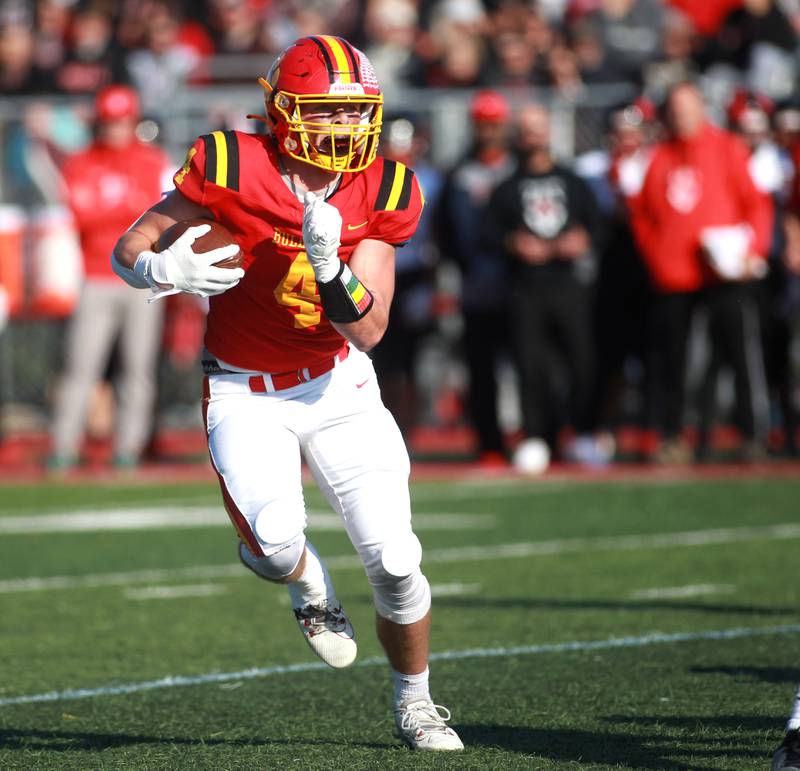 Batavia’s Charlie Whelpley runs the ball during the Class 7A second round playoff game against Lincoln-Way Central in Batavia on Saturday, Nov. 4, 2023.