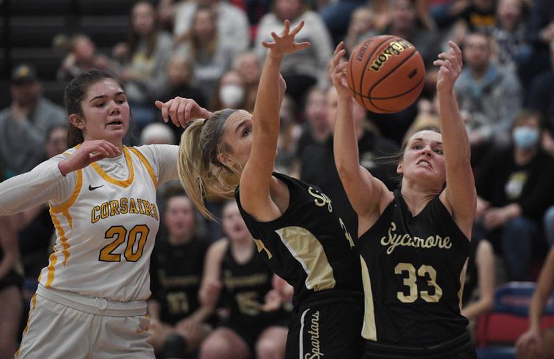 Sycamore’s Ella Shipley gets a rebound in the Class 3A Dundee-Crown supersectional game in Carpentersville on Monday, February 28, 2022.