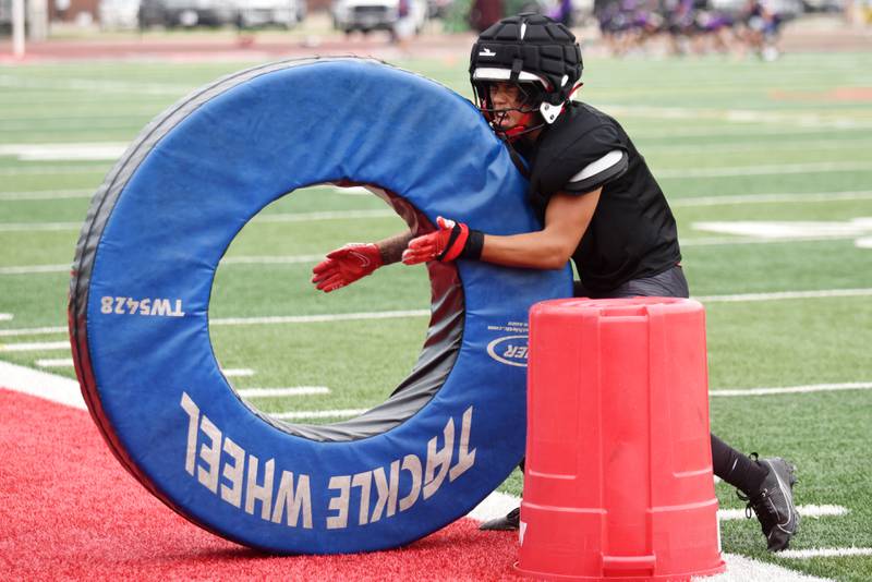 Bradley-Bourbonnais' Omari Taylor works through a tackling drill ahead of a joint summer workout the Boilermakers hosted with Wilmington Wednesday, July 16, 2025.