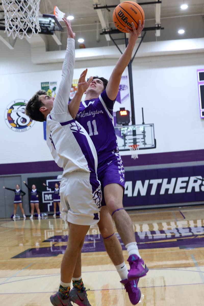 Wilmington's Ryan Kettman goes for a layup against Manteno's Braden Campbell during Wilmington's 60-35 victory over Manteno on Tuesday, Feb. 17, 2026.
