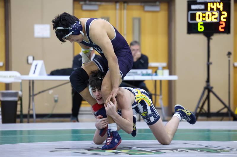 Yorkville Christian's Adrian Wadas-Luis wrestles Lisle's Johnny Consuegra-Lopez in the 144-pound third place match during the IHSA Class 1A Coal City Sectional on Saturday, Feb. 14, 2026.